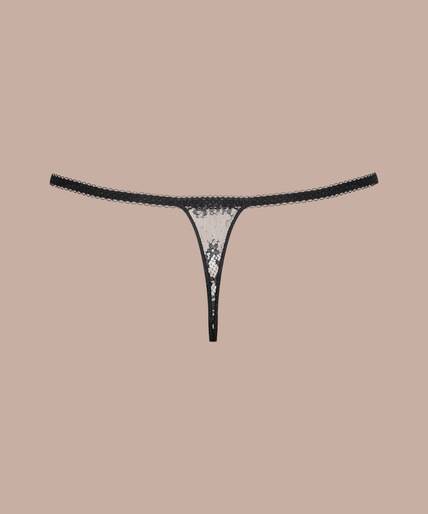 Maison Close/Scandale – Inspiration Divine Thong Black Inspiration Divine black Thong with sheer dotted mesh, floral lace and narrow side straps, front view on model.
