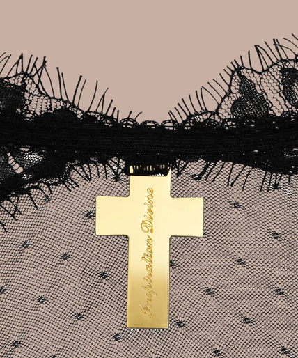 Maison Close/Scandale – Inspiration Divine Open Back Lace Thong Body Black Inspiration Divine black Open Back Lace Thong Body with sheer floral lace and a gold-tone cross at the collar, front view on model.