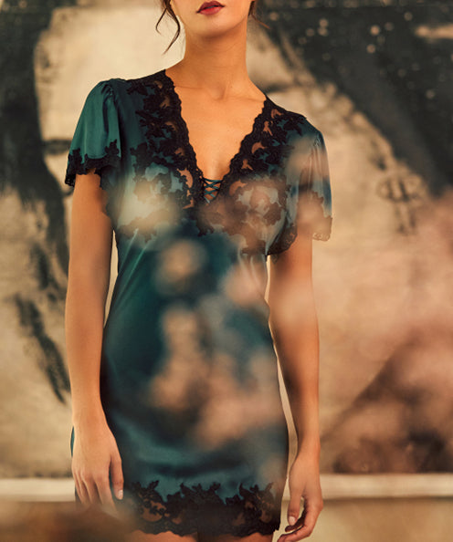 Model-image-Pleasurements-Marjolaine-Reine-Short-Sleeve-Dress-Cyan-and-Black-front-two