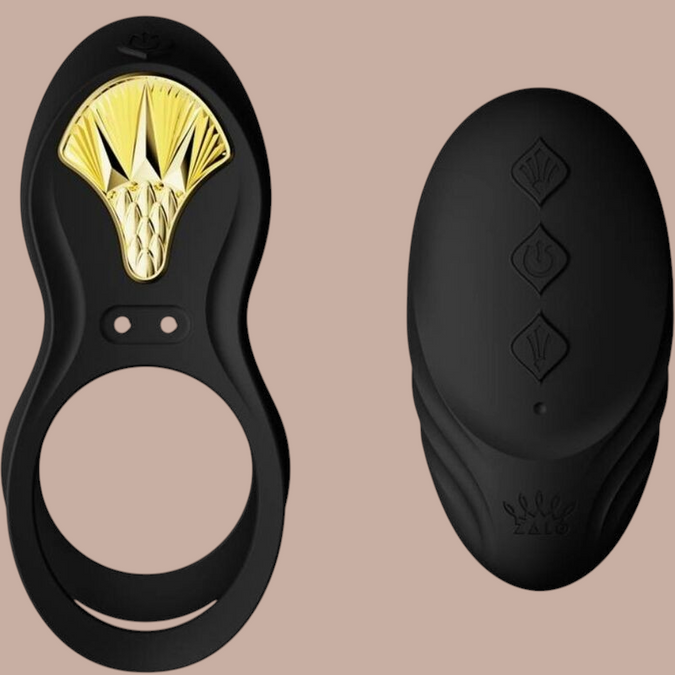 Pleasurements Zalo Bayek zwarte siliconen vibrerende koppelring met gouden accenten en draadloze afstandsbediening