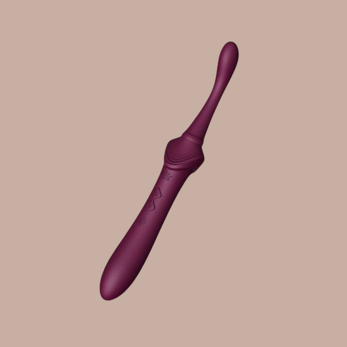 Paarse Zalo Bess 2 clitorisstimulator van Pleasurements gemaakt van zachte siliconen met verwarmingsfunctie