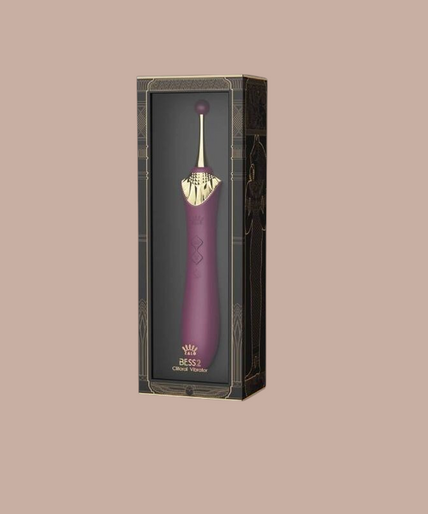 Zalo – Bess 2 Clitorismassager Paars Pleasurements Zalo Bess 2 paarse clitorisstimulator van siliconen met verwisselbare opzetstukken en gouden details.