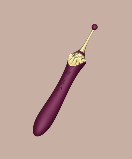 Zalo – Bess 2 Clitorismassager Paars Pleasurements Zalo Bess 2 paarse clitorisstimulator van siliconen met verwisselbare opzetstukken en gouden details.