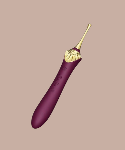 Zalo – Bess 2 Clitorismassager Paars Pleasurements Zalo Bess 2 paarse clitorisstimulator van siliconen met verwisselbare opzetstukken en gouden details.