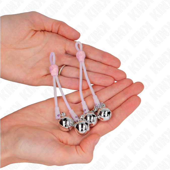 KINK - LICHTGEVENDE SCHEDEL TEPELKLEMMEN MET BELLETJES VERSTELBAAR ROZE / ZILVER