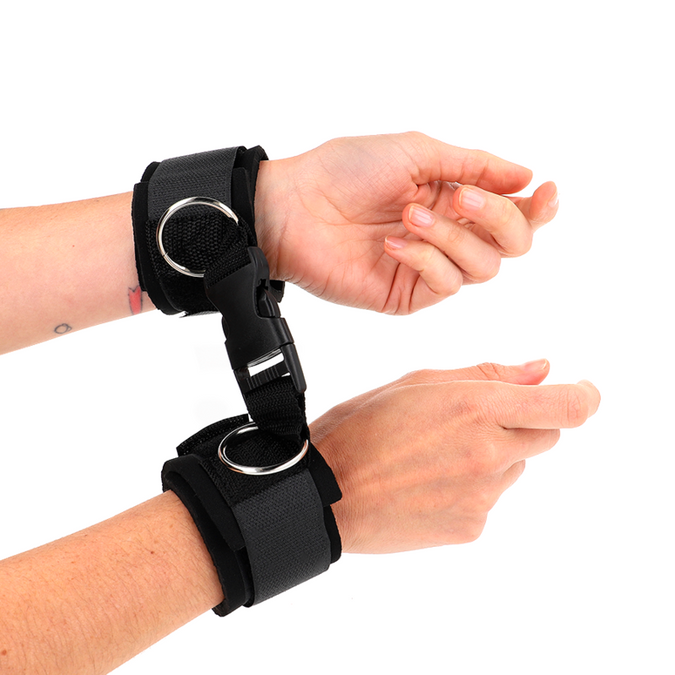 Kink – Neopreen klittenband polsboeien zwart verstelbaar 22 – 34 cm