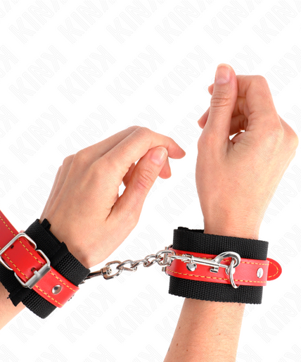 KINK - NYLON WRIST RESTRAINTS BLACK WITH LEATHERETTE RED ADJUSTABLE 19-24 CM X 5.5 CM KINK - NYLON WRIST RESTRAINTS BLACK WITH LEATHERETTE RED ADJUSTABLE 19-24 CM X 5.5 CM