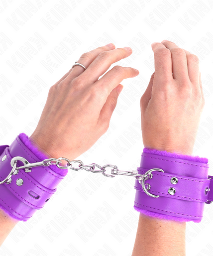 KINK - FUR LINED WRIST RESTRAINTS WITH SQUARE HOLES PURPLE AND PURPLE BELT ADJUSTABLE 17-29 CM X 6 CM KINK - FUR LINED WRIST RESTRAINTS WITH SQUARE HOLES PURPLE AND PURPLE BELT ADJUSTABLE 17-29 CM X 6 CM