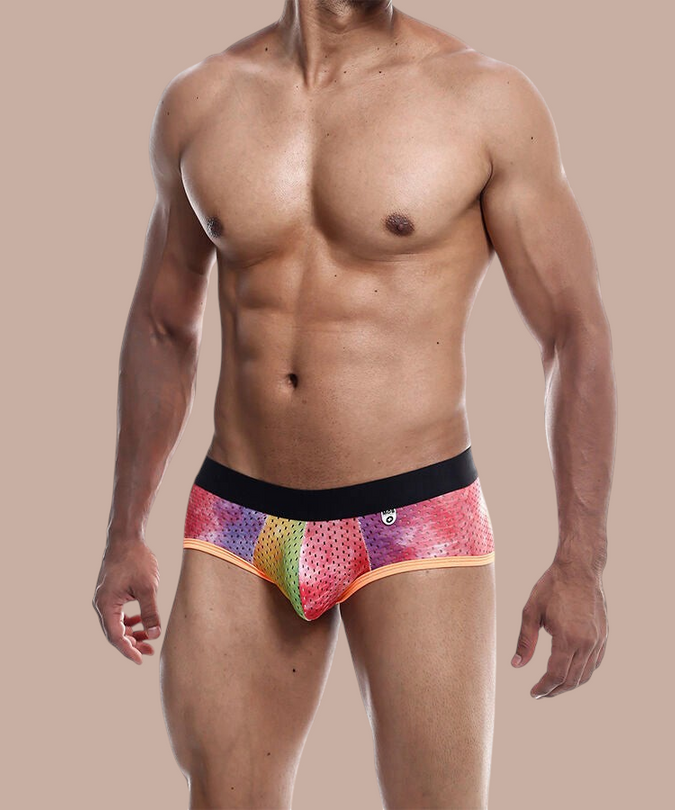 Pleasurements Mob boxer brief in oranje kant met kleurrijk patroon en zwarte tailleband gedragen door een model
