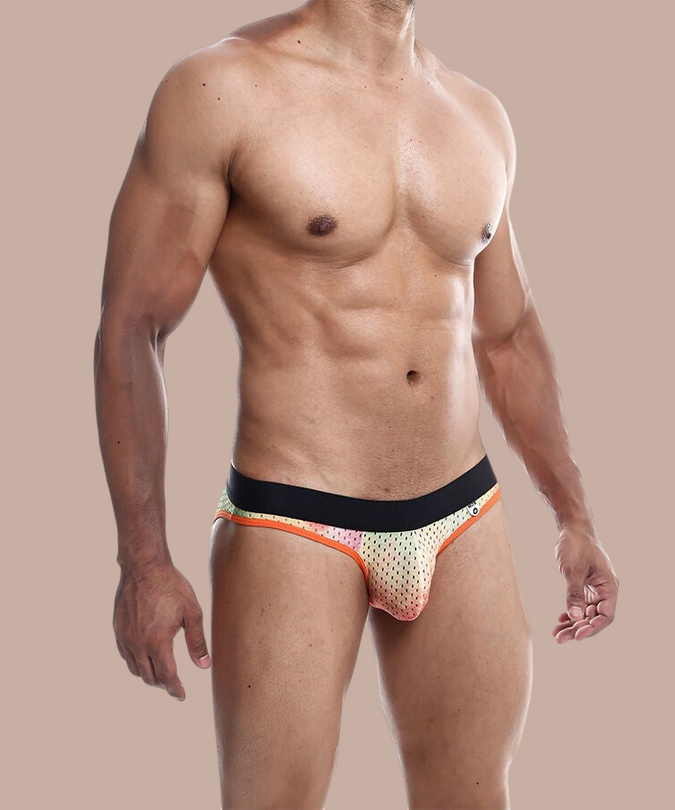 Pleasurements Mob oranje boxer jock van kant gedragen door een man voor een elegante en sensuele uitstraling.