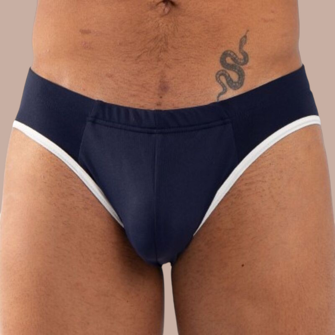 Pleasurements Burn 020 slip in navy met witte accenten voor een verfijnde en comfortabele pasvorm.