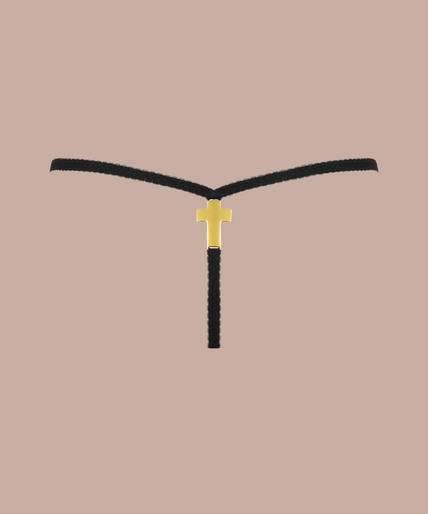 Inspiration Divine black Cross Micro Thong with a sheer floral lace front and narrow side straps, front view on model.