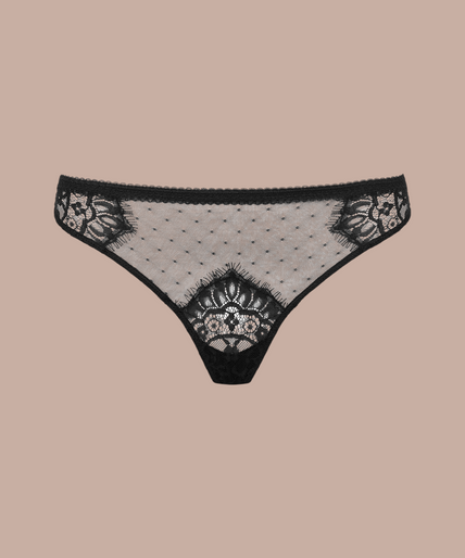 Inspiration Divine black Panty with sheer dotted mesh and floral lace panels, front view on model.