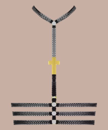 Inspiration Divine black Cross Bustier Harness with gold-tone cross detail, front view on model.