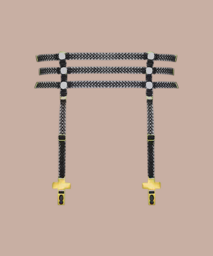 Inspiration Divine black Cross Garters Belt with gold-tone cross clips, front view on model.