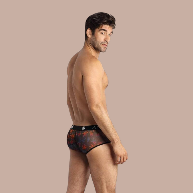 Pleasurements Anais Men Chill boxer brief met kleurrijk bladerpatroon op zwarte transparante stof