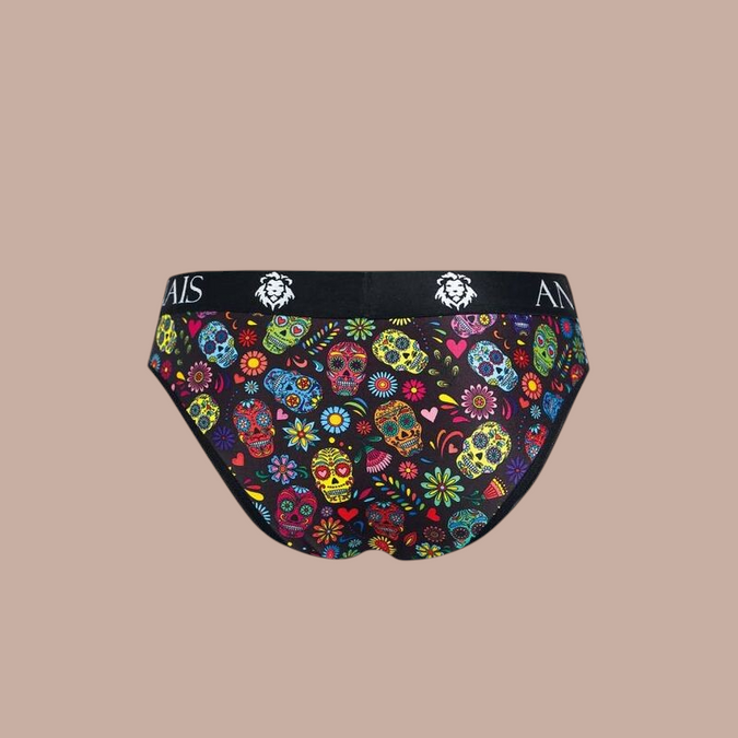 Pleasurements Anais Men Mexico Slip met kleurrijke schedelprint op zwarte achtergrond en elastische tailleband.