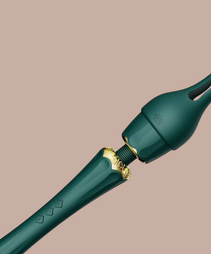 Pleasurements Zalo Kyro groene siliconen wandmassager met gouden details en verwisselbare opzetstukken