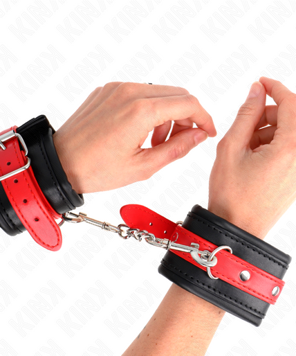 KINK - WRIST RESTRAINTS BLACK WITH RED BELT ADJUSTABLE 17-28 CM X 6 CM