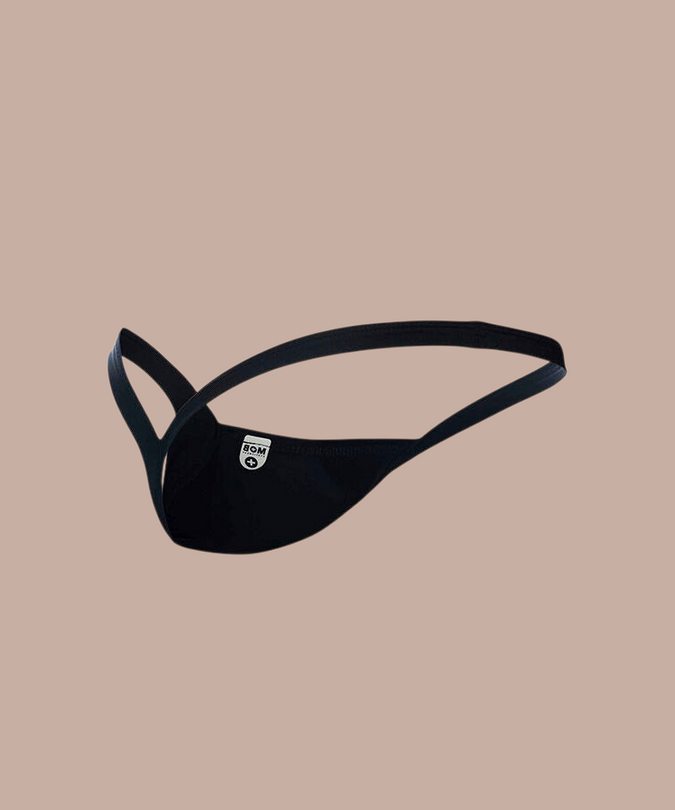 Pleasurements Mob zwarte string met minimalistisch design voor een sensueel en zelfverzekerd silhouet.