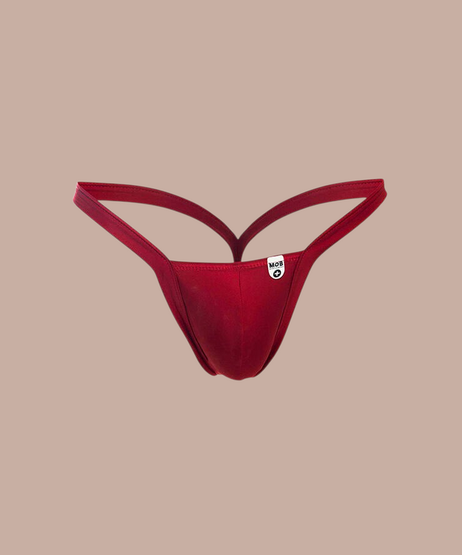 Pleasurements Mob rode string in maat S met minimalistisch design voor een sensueel en zelfverzekerd gevoel.