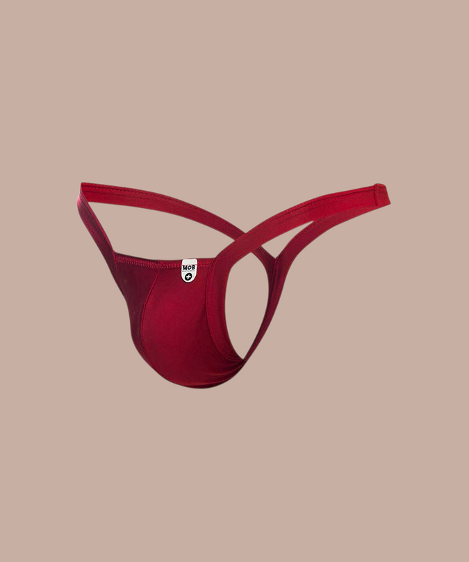 Pleasurements Mob rode string in maat S met een verleidelijk en comfortabel ontwerp voor intieme momenten.